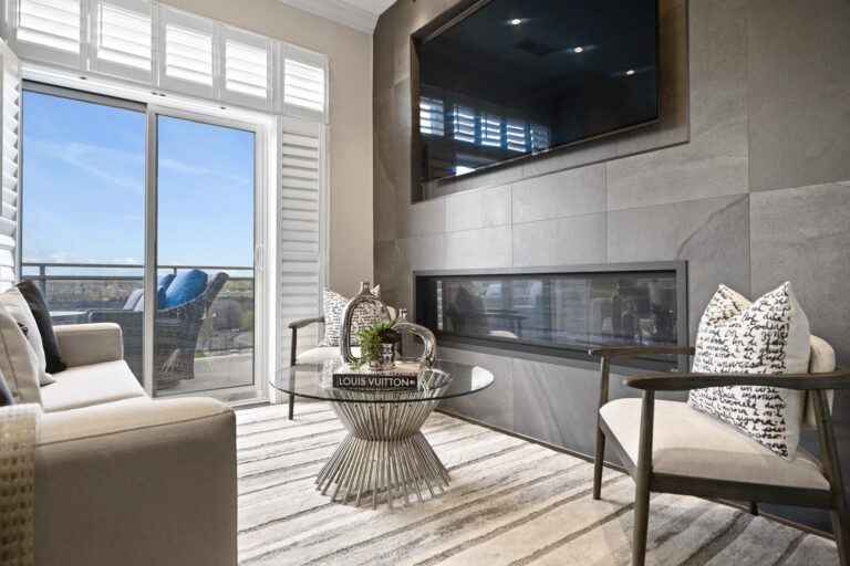 Glass Table in a Living Room Full Penthouse Renovation